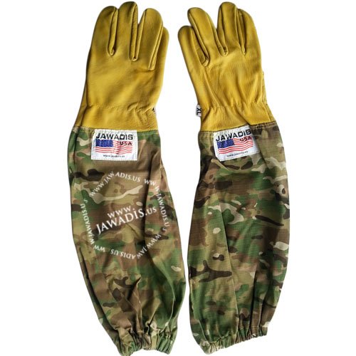 Leather beekeeping gloves worn during hive inspection for full hand and arm protection