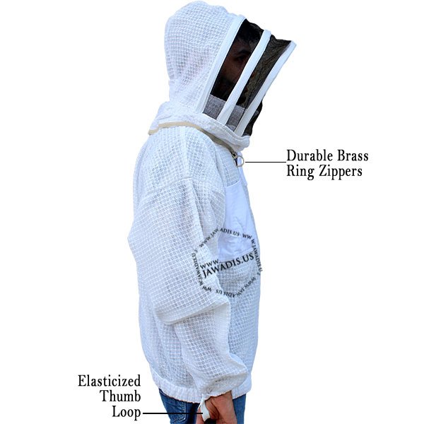 Beekeeper wearing Jawadis ventilated bee jacket with veil in a hive yard